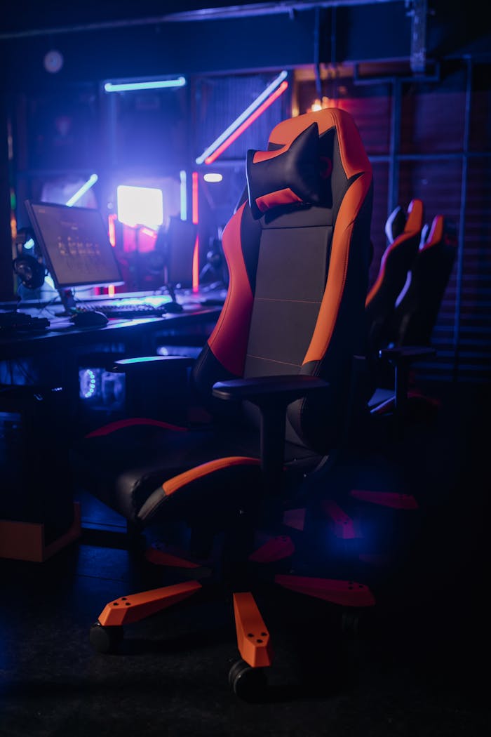 photo-of-a-black-and-orange-gaming-chair-7862645